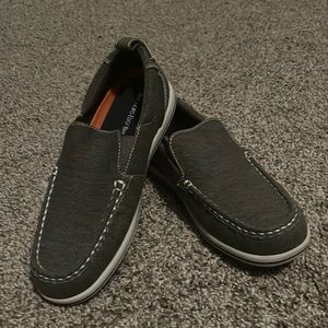 Boys size 5 like new boat shoe. Worn only a couple times